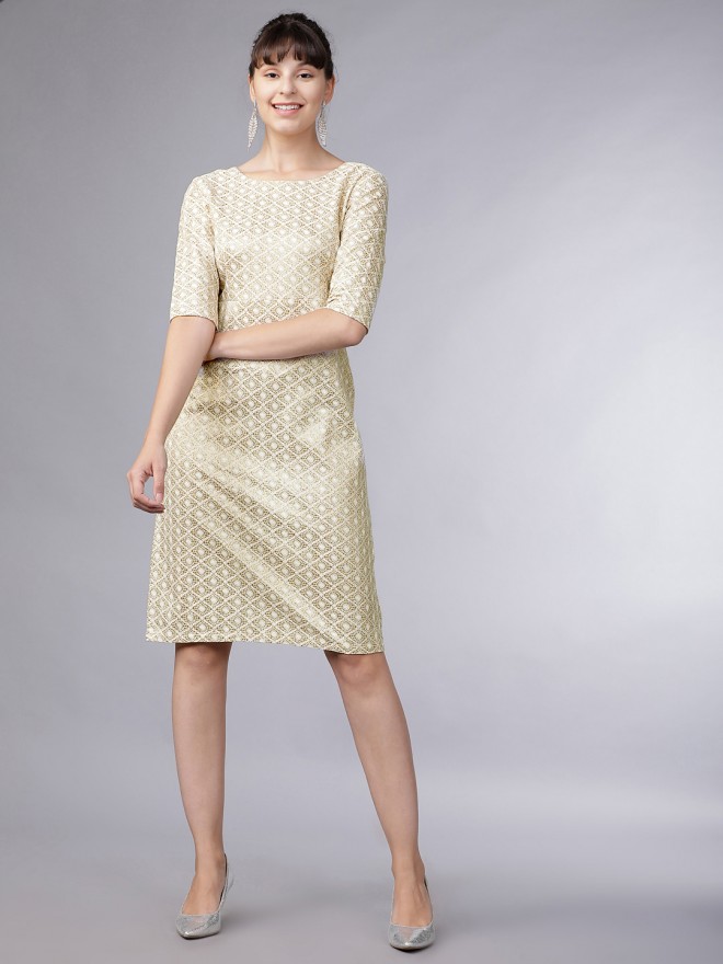 cream colored sheath dress