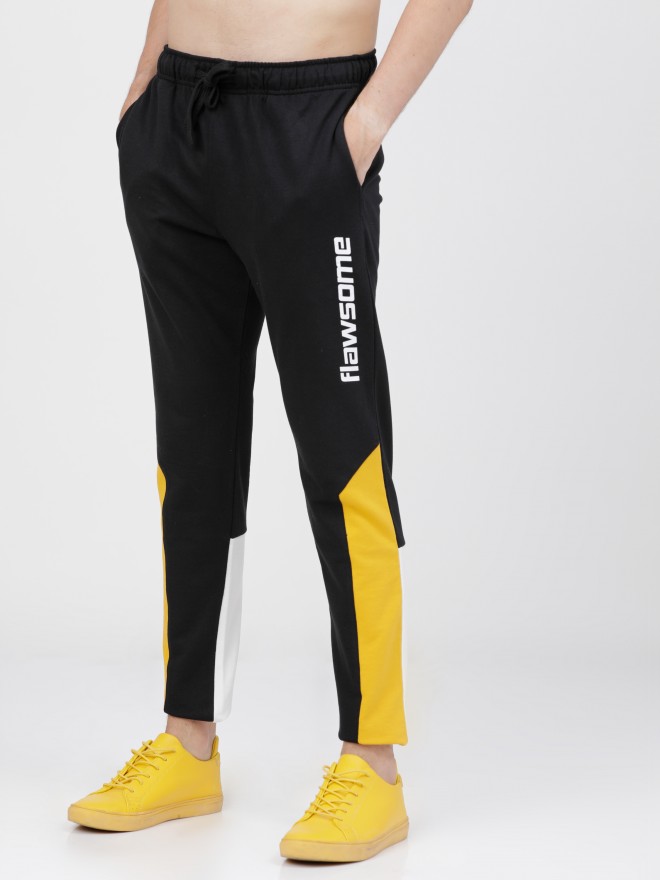 Buy Black  Yellow Track Pants for Men by ECKO Online  Ajiocom