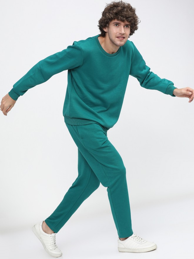 teal track pants