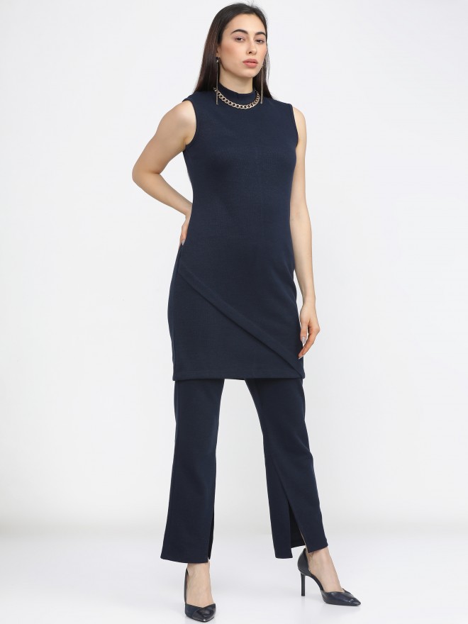 Buy Online Women Blue Solid Bootcut Trousers at best price  Plussin
