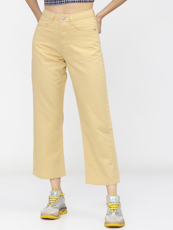 Pastel yellow outlet jeans