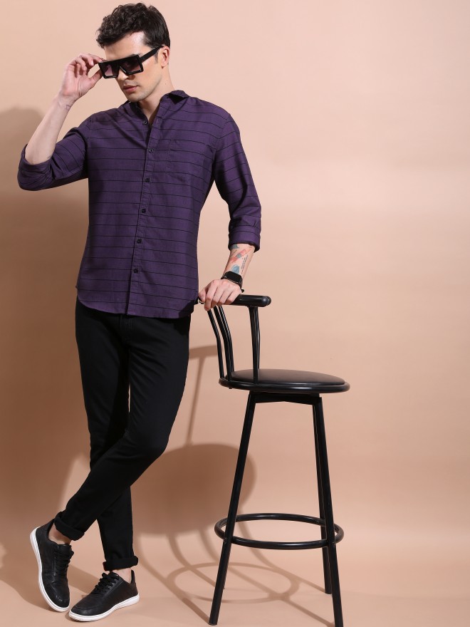 Purple shirt black store jeans