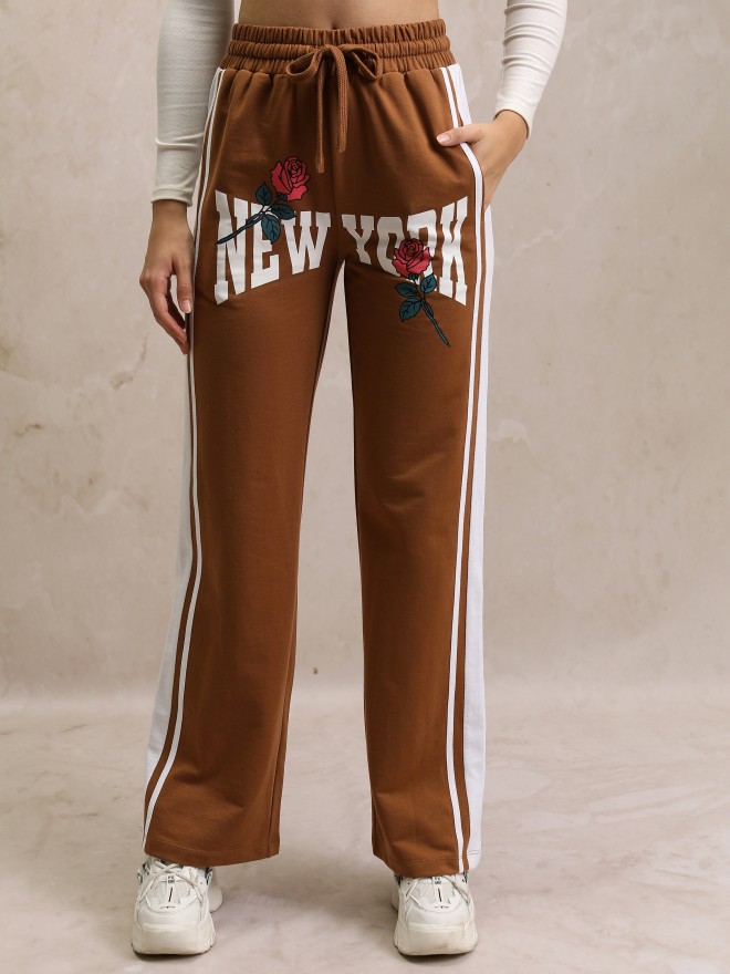 Buy Tokyo Talkies Brown Solid Flared Bootcut Trousers for Women Online at  Rs.629 - Ketch