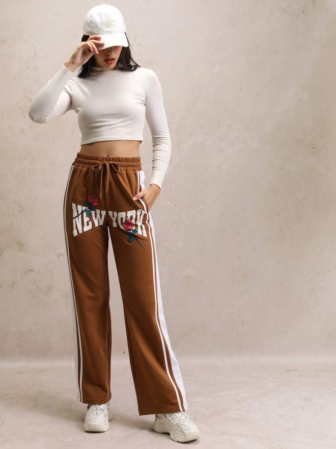 Buy Tokyo Talkies Brown Solid Flared Bootcut Trousers for Women Online at  Rs.629 - Ketch