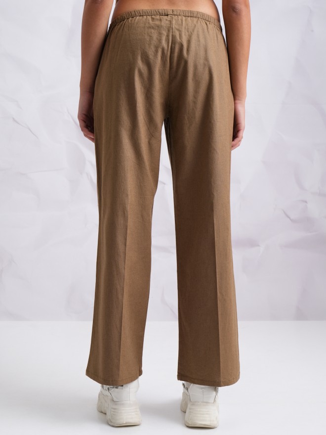 Buy Tokyo Talkies Brown Solid Flared Casual Trousers for Women Online at  Rs.689 - Ketch