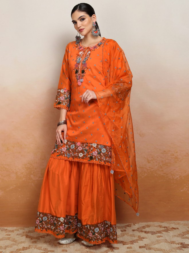 Vishudh Women Orange Embroidered Kurta With Sharara And Dupatta